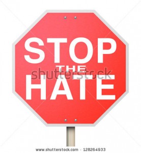 stock-photo-a-red-octogon-shapped-sign-reading-stop-the-hate-symbolizing-the-need-to-end-intolerance-racism-128264933